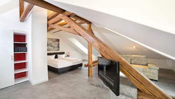 Suite estudio junior (incl.3.50€ Energy Fee p.pers./p.night) | Ropa de cama de alta calidad y caja de seguridad en la habitación