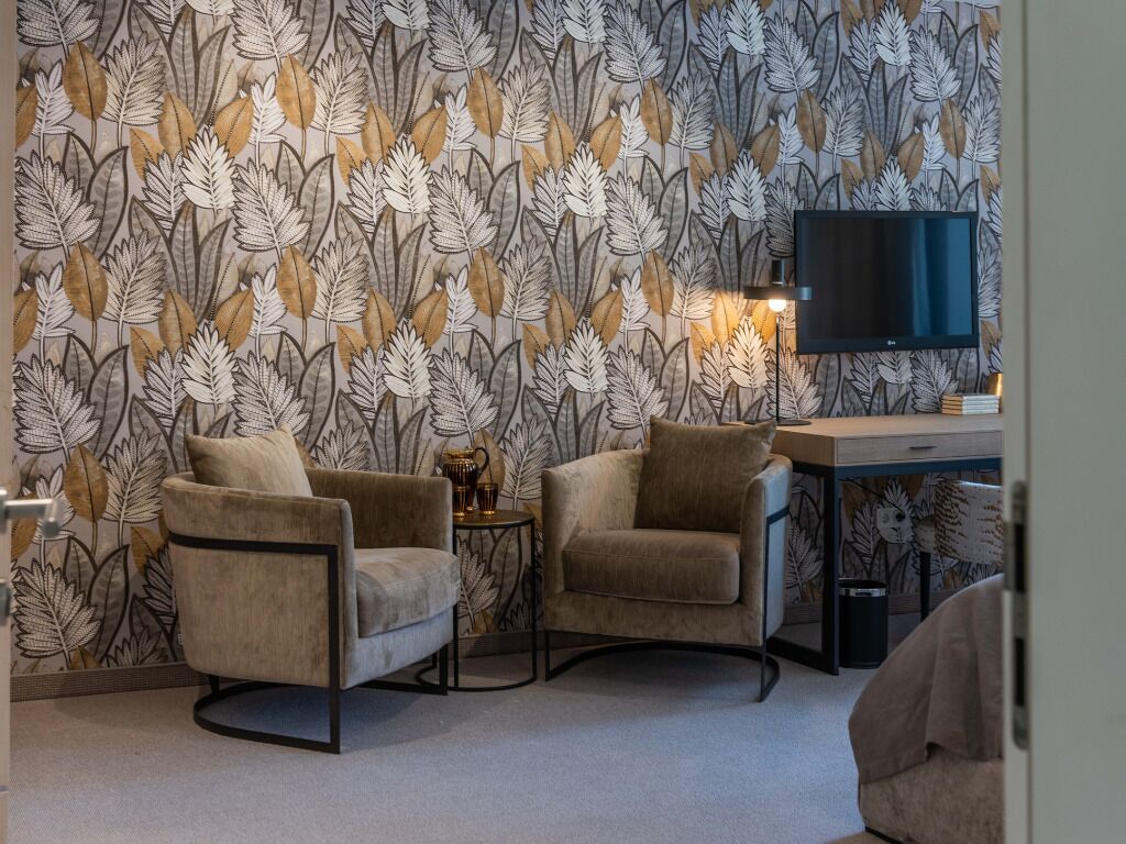 junior suite, 1 king bed, non smoking, balcony | living area | 64-inch lcd tv with digital channels, tv