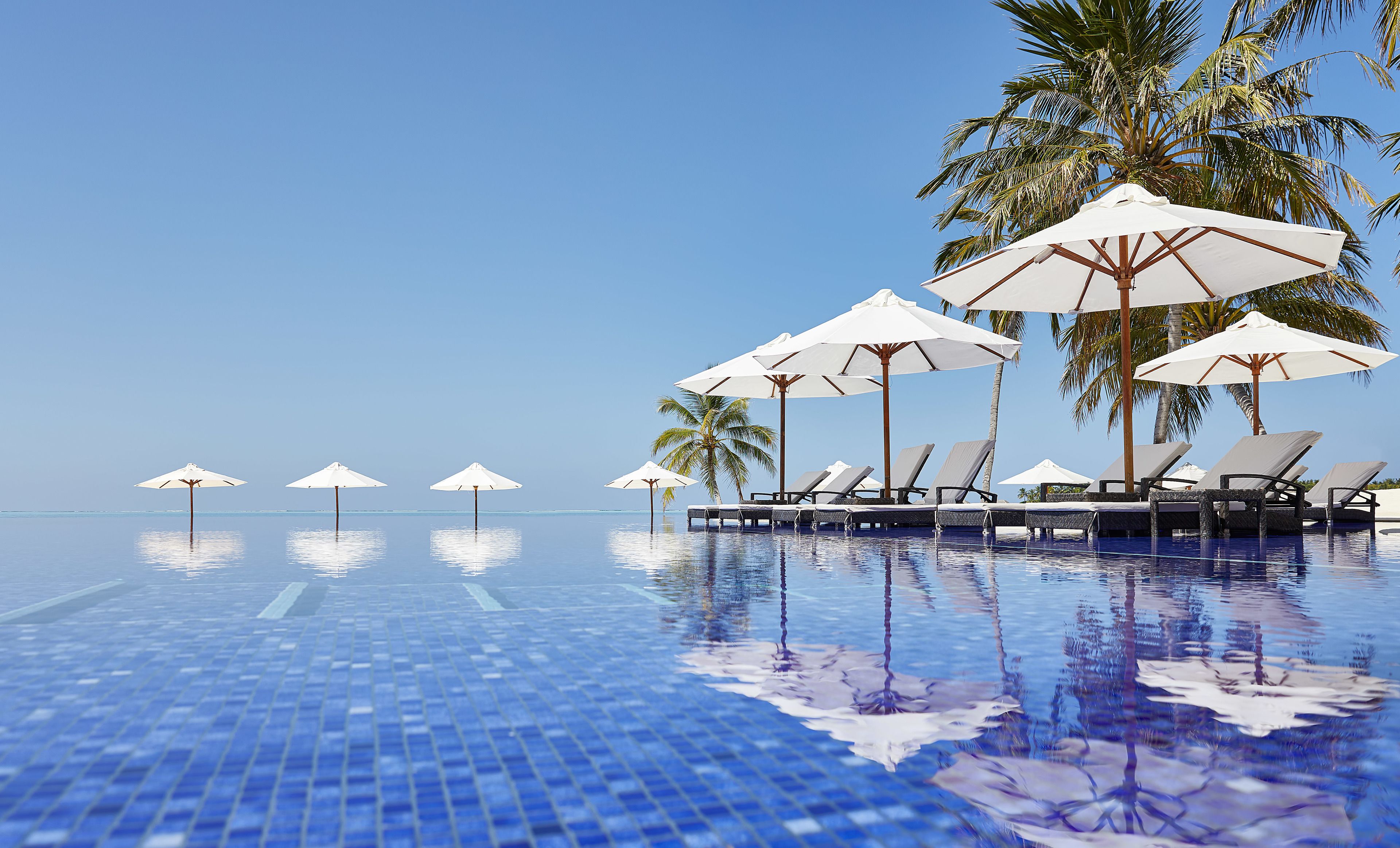 3 outdoor pools, open 9:00 AM to 6:00 PM, pool umbrellas, sun loungers