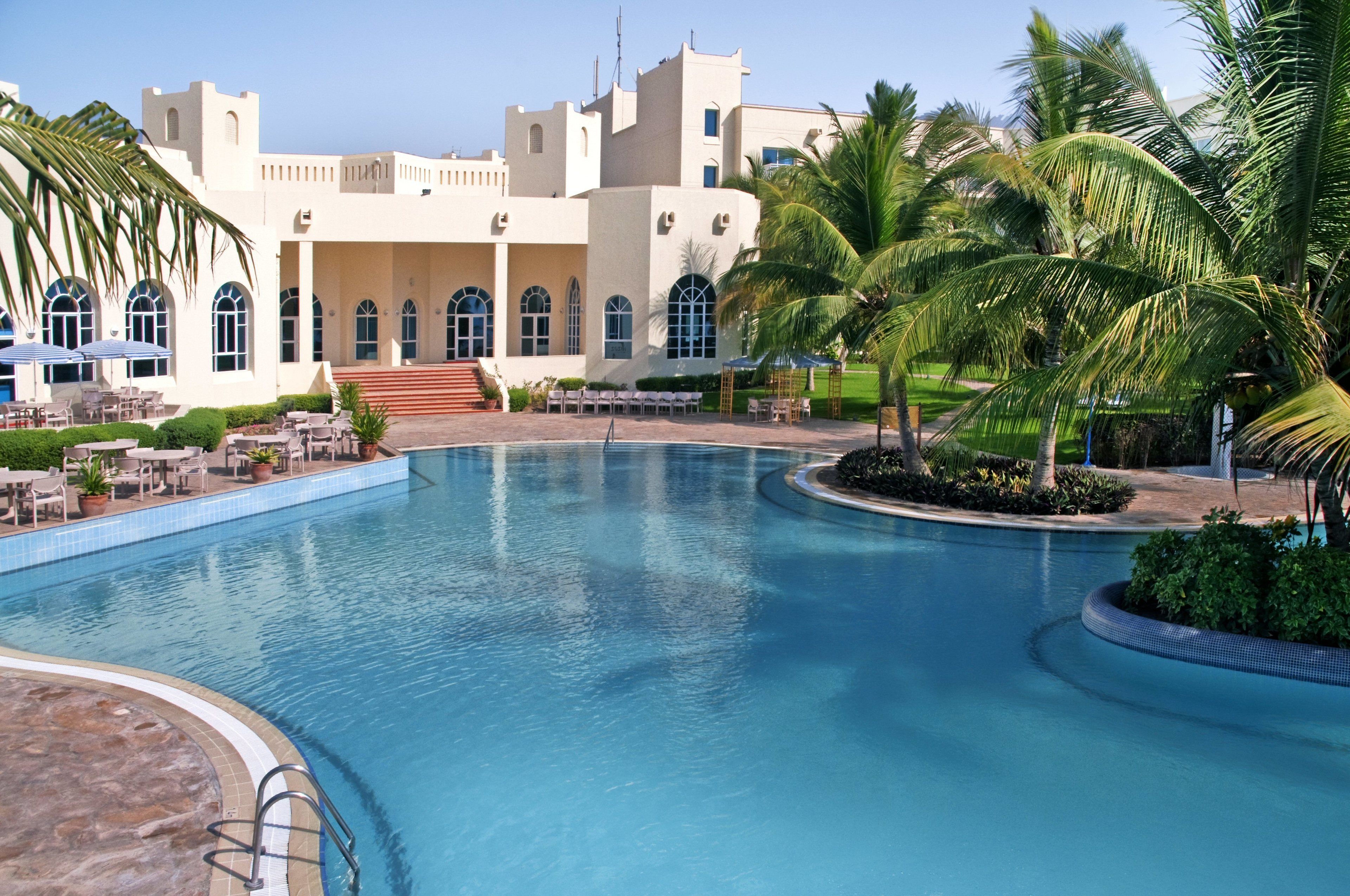 Outdoor pool, open 8:00 AM to 8:00 PM, pool umbrellas, pool loungers