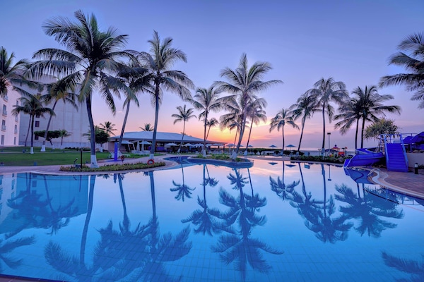 Outdoor pool, open 8:00 AM to 8:00 PM, pool umbrellas, pool loungers