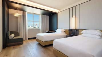 Chambre Deluxe, 2 lits une place | Literie de qualité supérieure, minibar, coffres-forts dans les chambres