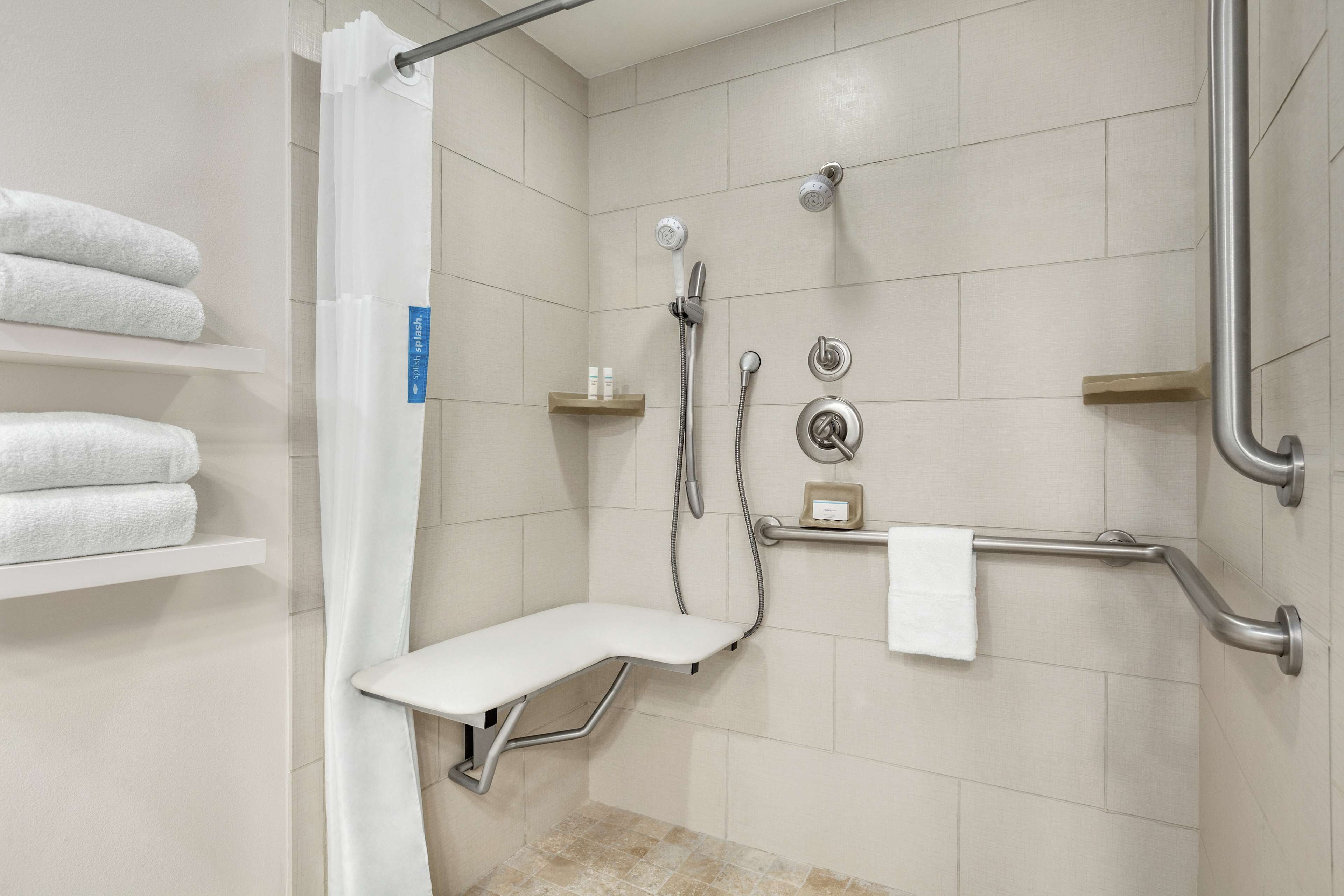 room, 1 queen bed, accessible, non smoking (roll in shower) | bathroom | free toiletries, hair dryer, towels