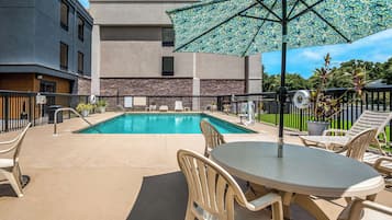 Outdoor pool, pool umbrellas, sun loungers