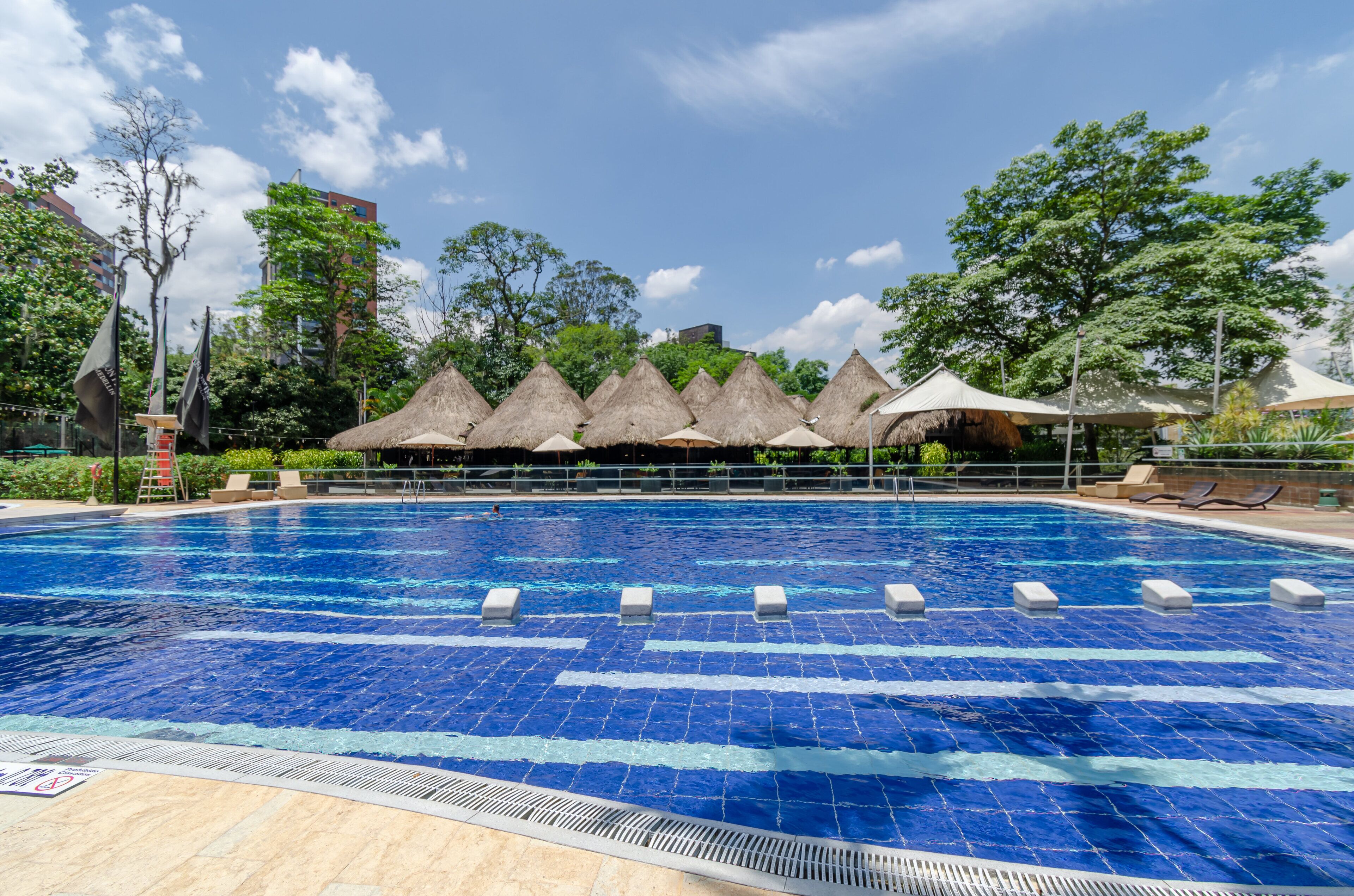 2 outdoor pools, pool umbrellas, pool loungers
