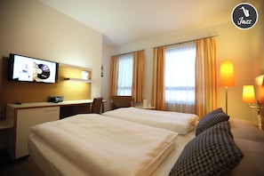 Premium bedding, minibar, in-room safe, desk