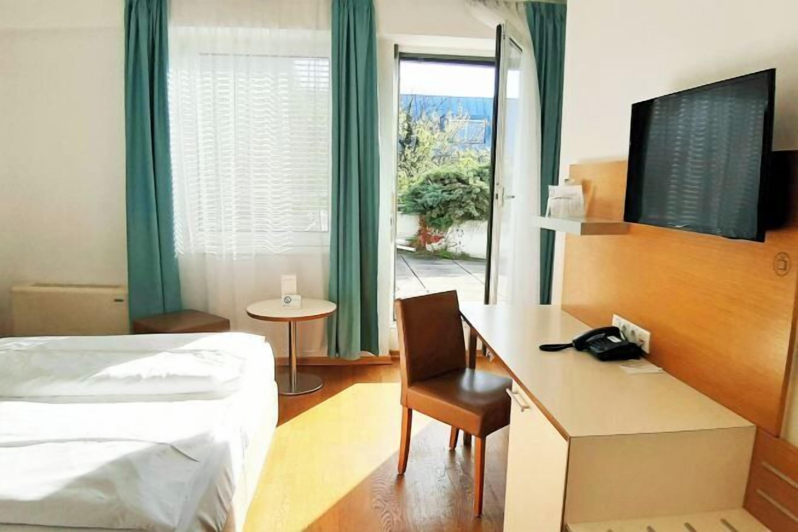 Biancheria da letto di alta qualità, minibar, una cassaforte in camera