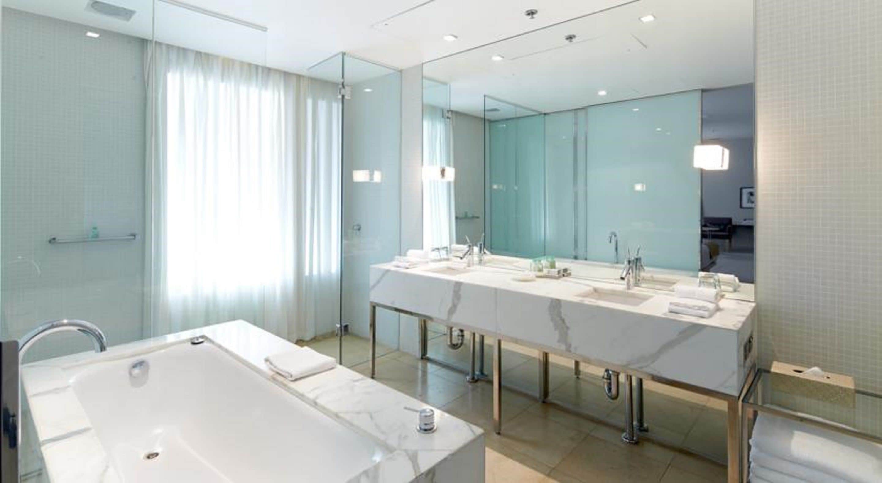 shower, rainfall showerhead, designer toiletries, hair dryer