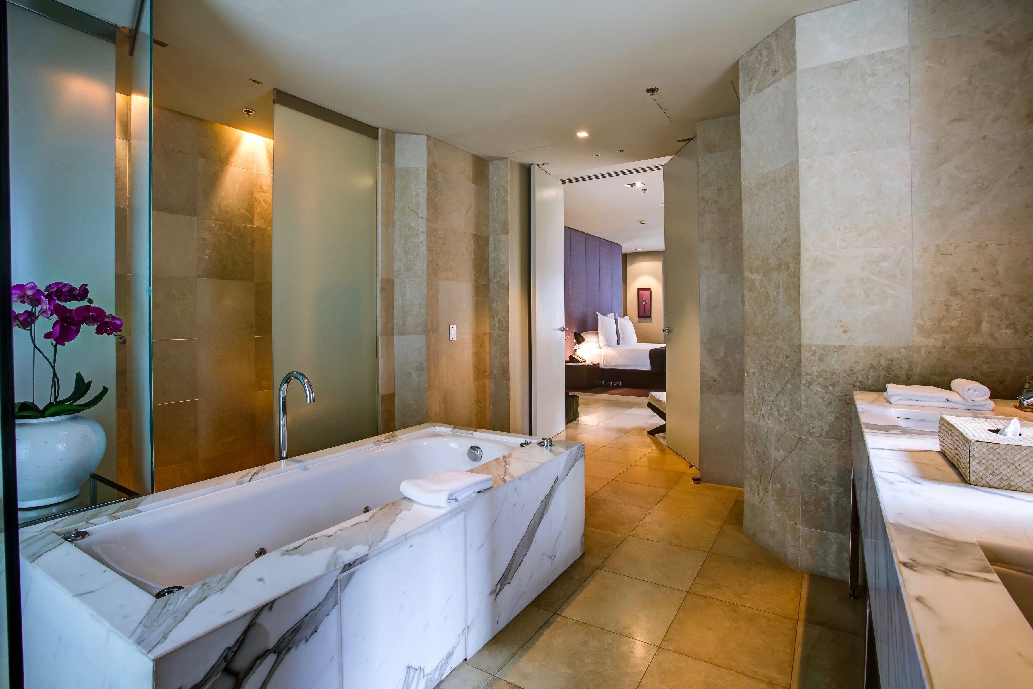 duplex penthouse | bathroom | shower, rainfall showerhead, designer toiletries, hair dryer