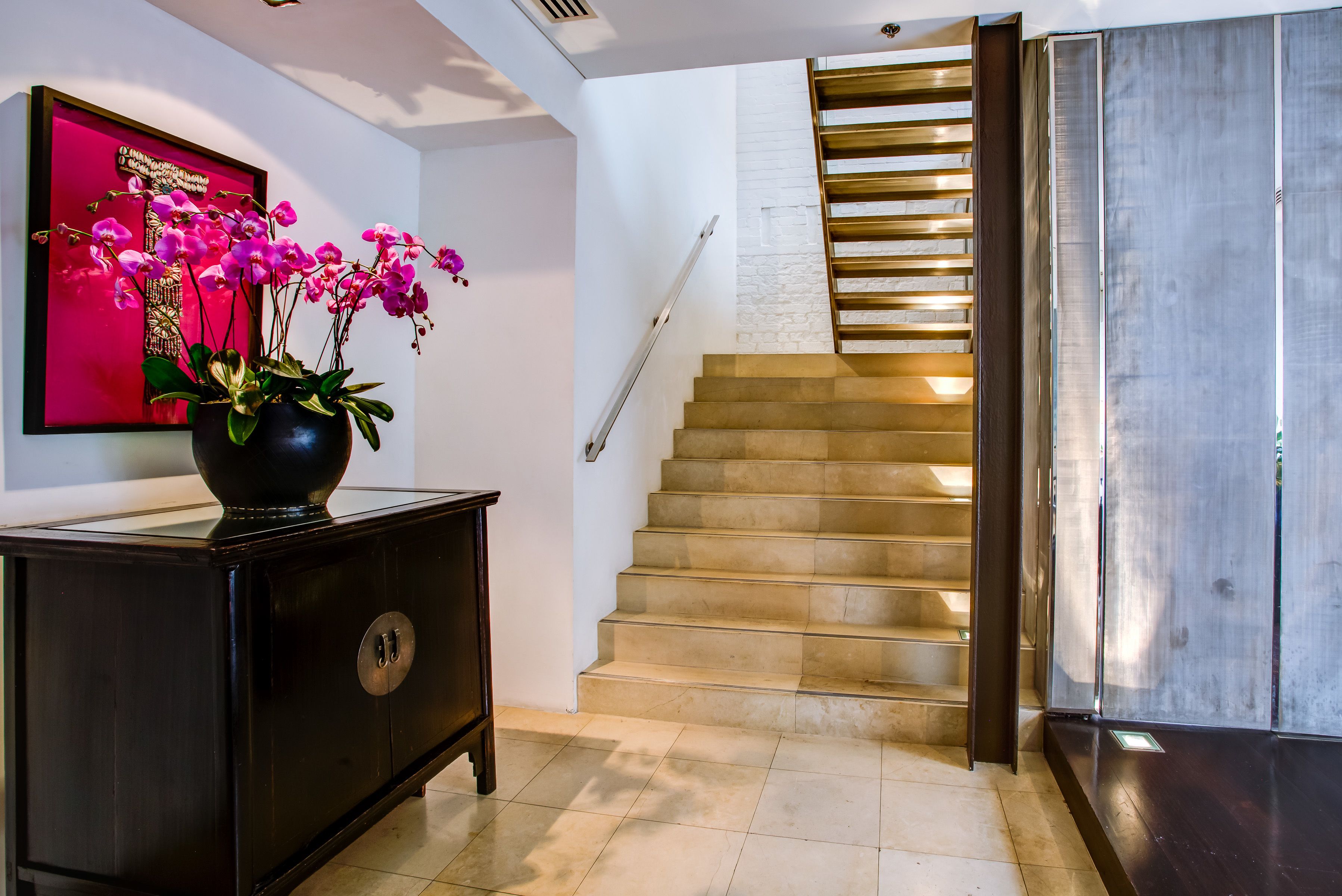 loft penthouse | living area | 45-inch flat-screen tv with satellite channels, tv, ipad