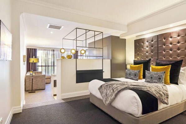 Luxe beddengoed, pillowtop-bedden, een kluis op de kamer