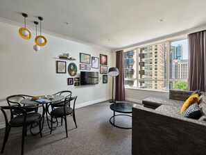 Deluxe Room, 2 Bedrooms | Living area | 32-inch flat-screen TV with cable channels, TV, streaming services - Mantra 2 Bond Street Sydney (Sydney)