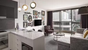 A modern apartment with a kitchen, dining area, and living room. - Mantra 2 Bond Street Sydney (Sydney)