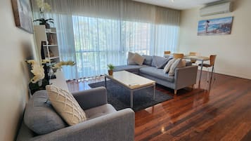 Deluxe Two-Bedroom Apartment | Living area