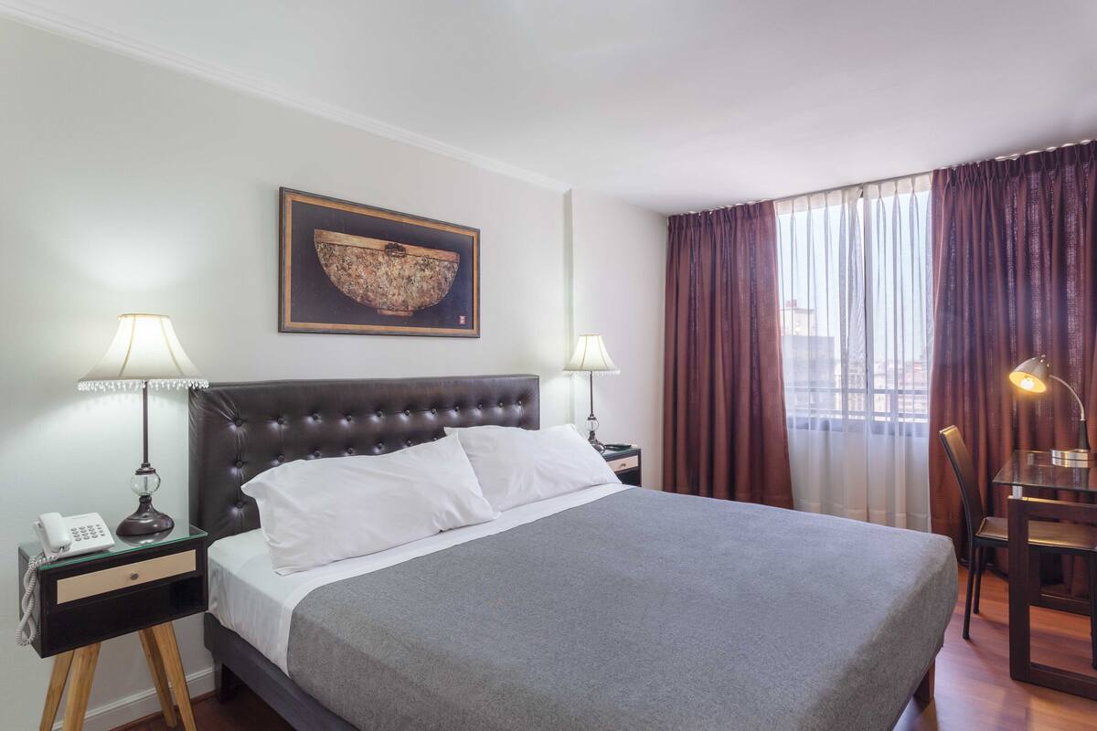 Departamento Deluxe, 1 habitación, para no fumadores | Ropa de cama de alta calidad y caja de seguridad en la habitación