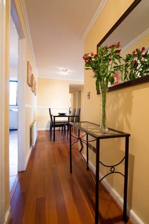 Deluxe Apartment, 2 Bedrooms | Living area | 32-inch flat-screen TV with satellite channels, TV, DVD player