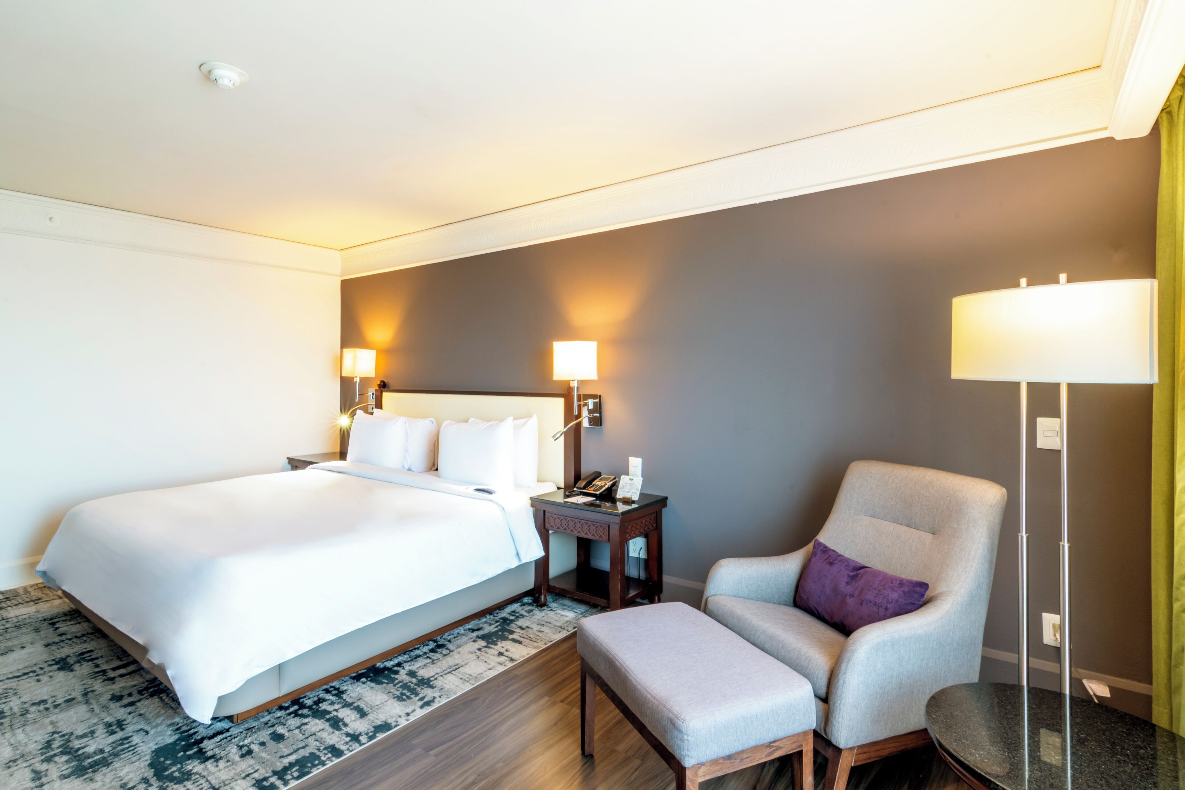 deluxe room, 1 king bed | premium bedding, in-room safe, desk, blackout curtains