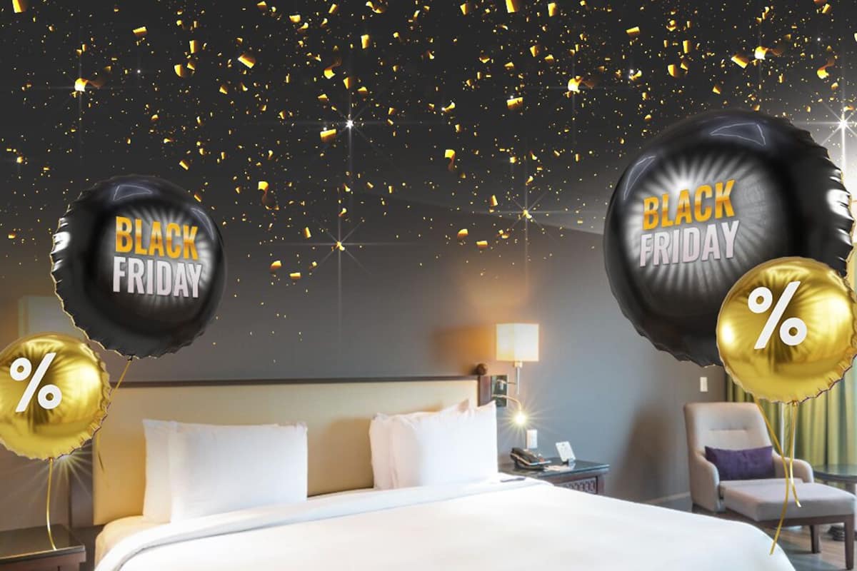 Ropa de cama de alta calidad y caja de seguridad en la habitación