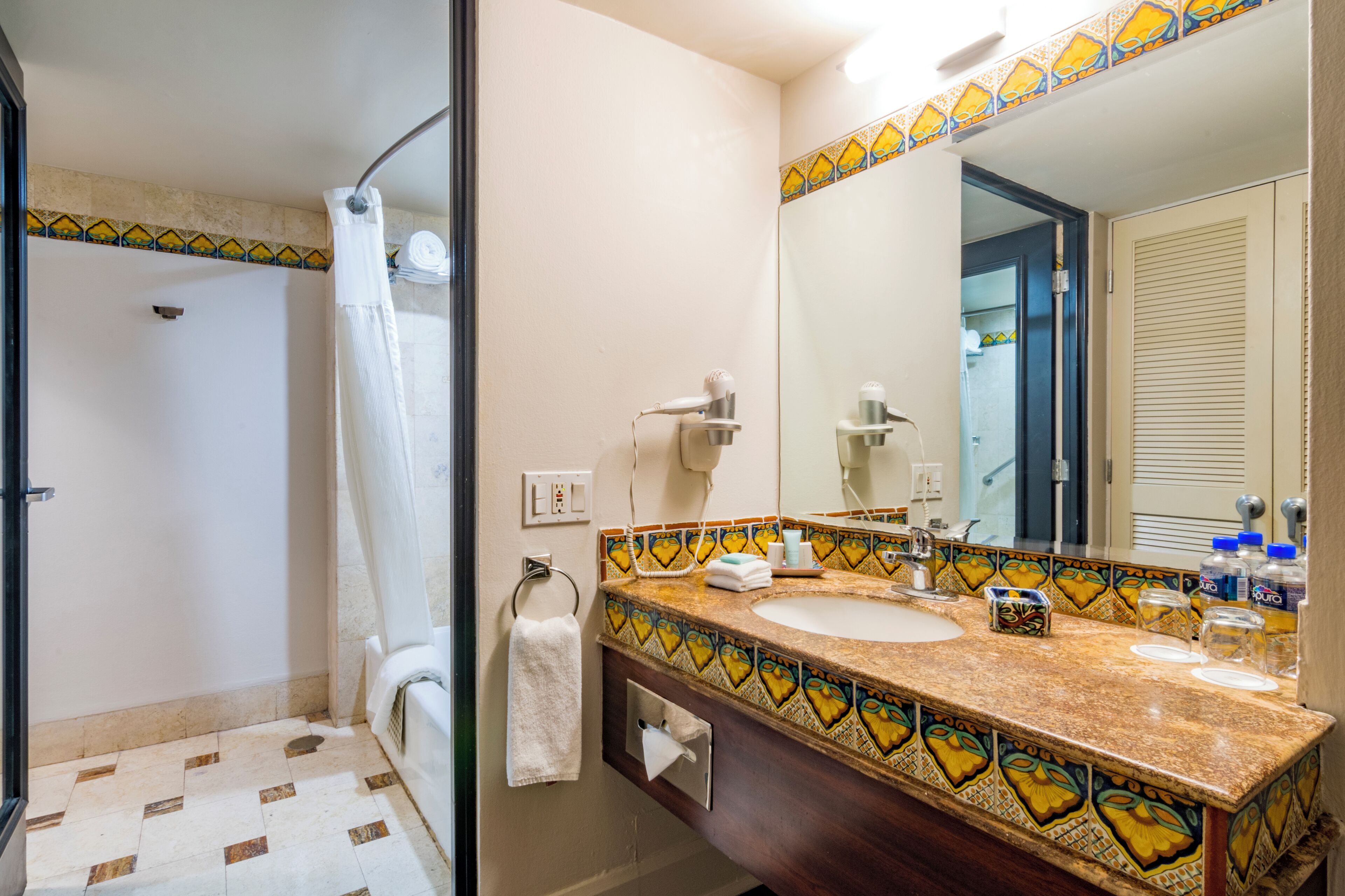 deluxe double room, 2 double beds | bathroom | combined shower/bathtub, rainfall showerhead, free toiletries