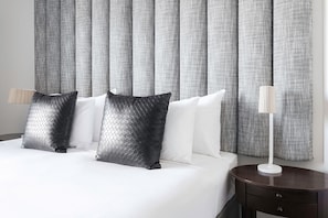 Premium bedding, minibar, in-room safe, blackout drapes