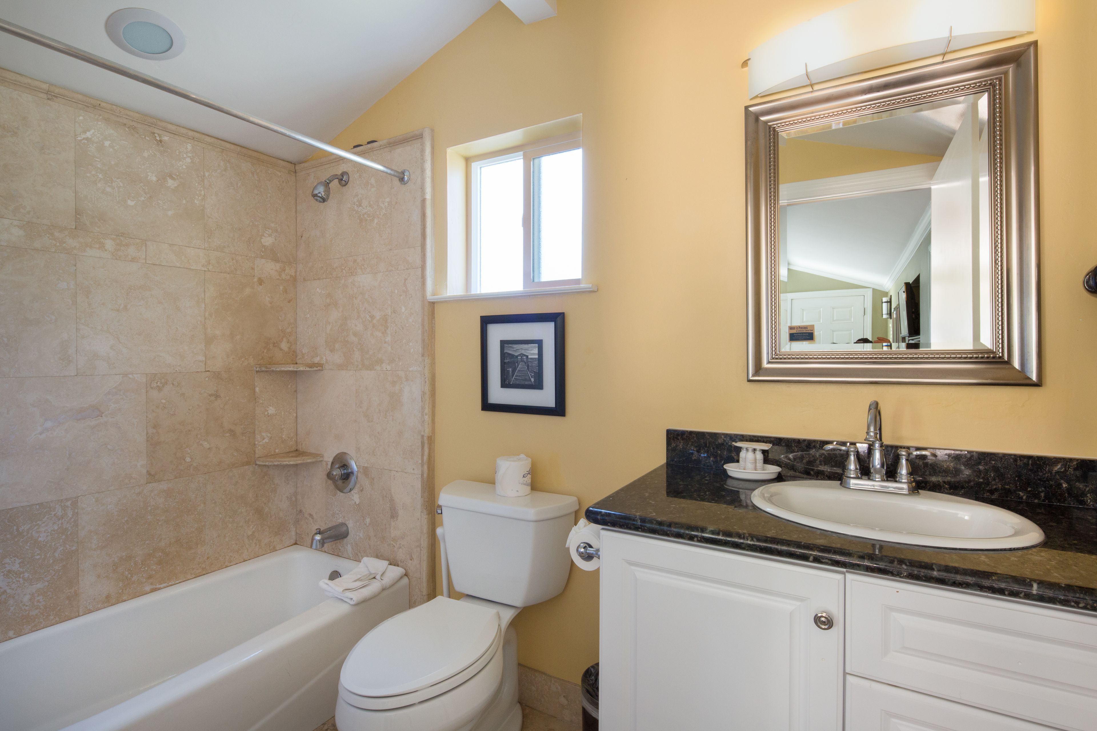 Cottage, 1 Queen Bed | Bathroom | Shower, hair dryer, towels, soap