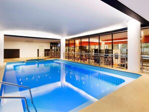 Indoor pool, open 6:00 AM to 10:00 PM, pool loungers