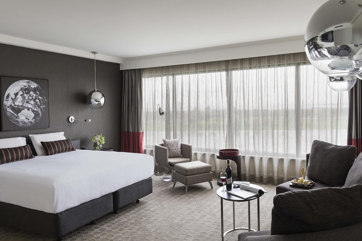 deluxe room, 1 king bed, lake view | 1 bedroom, premium bedding, minibar, in-room safe