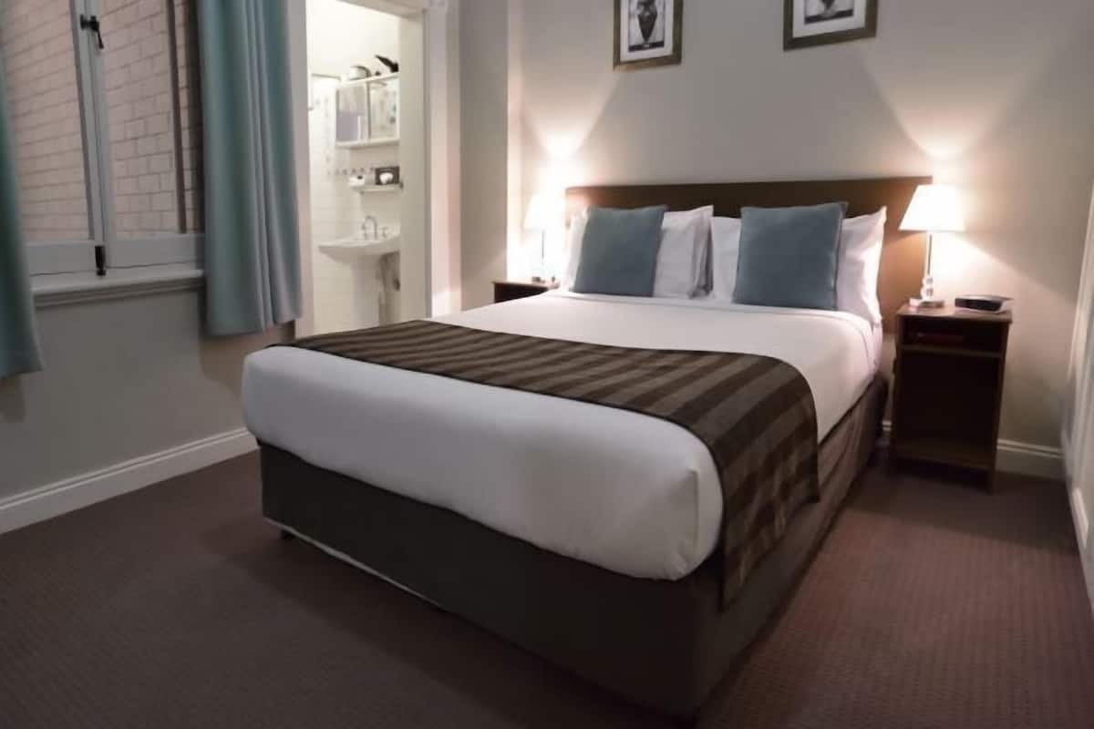 Premium bedding, laptop workspace, iron/ironing board, cribs/infant beds