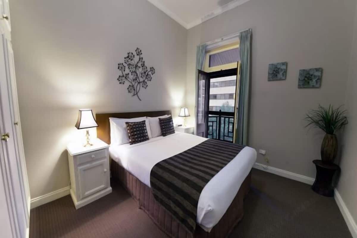 Premium bedding, laptop workspace, iron/ironing board, cribs/infant beds