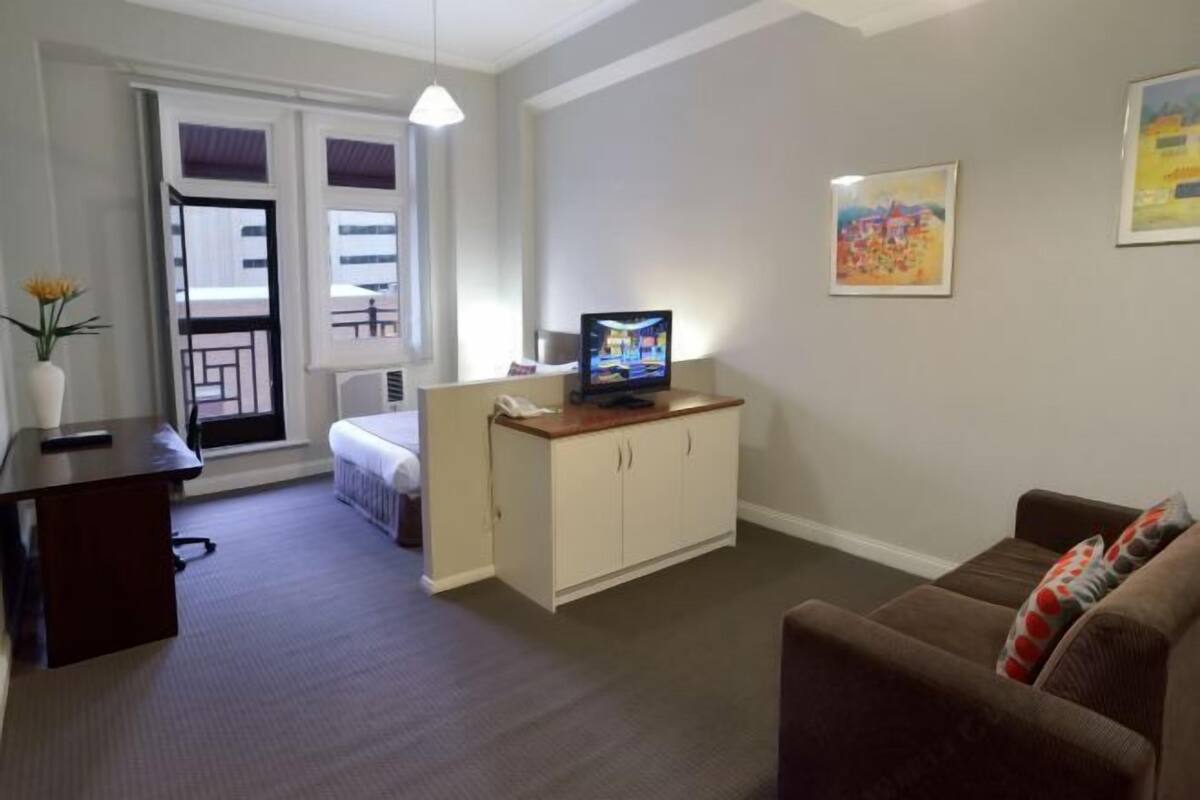 Premium bedding, laptop workspace, iron/ironing board, cribs/infant beds