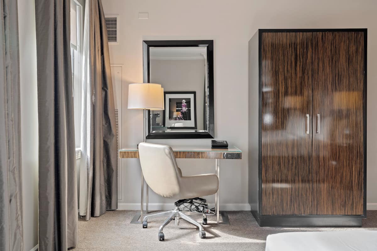 Premium bedding, pillowtop beds, desk, laptop workspace