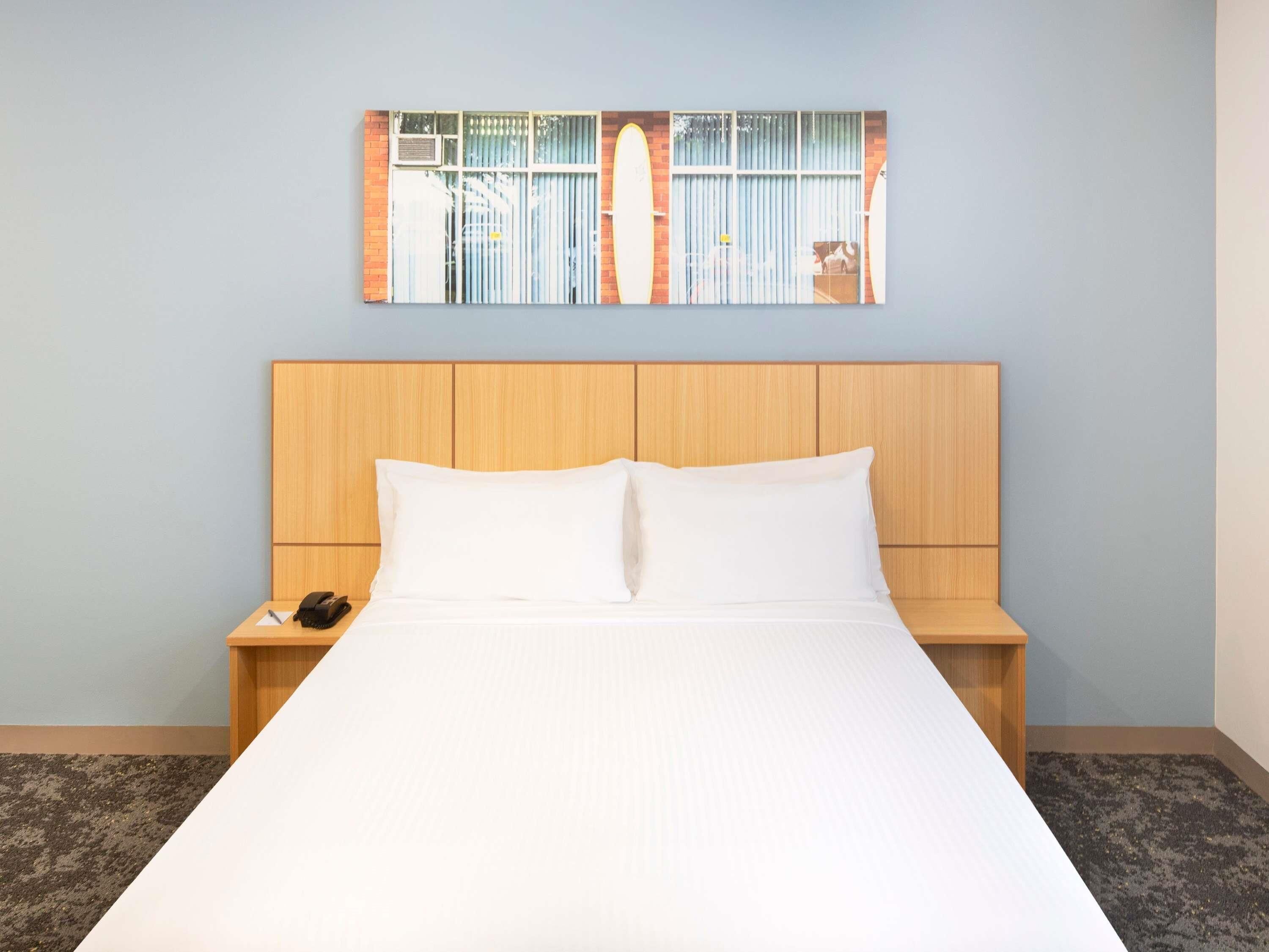Standard Room, 1 Queen Bed | In-room safe, iron/ironing board, free cribs/infant beds, rollaway beds