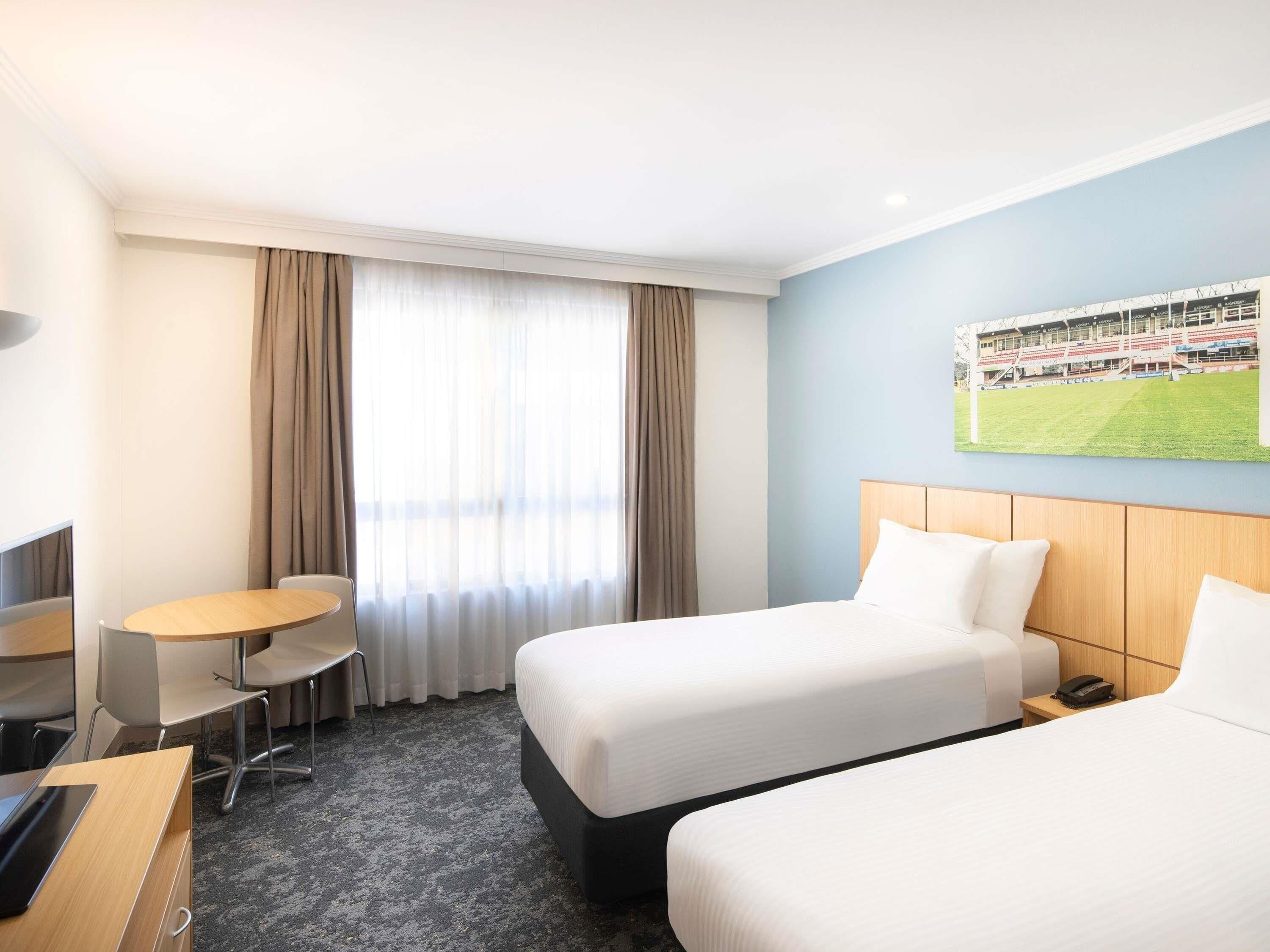 Standard Twin Room | In-room safe, iron/ironing board, free cribs/infant beds, rollaway beds