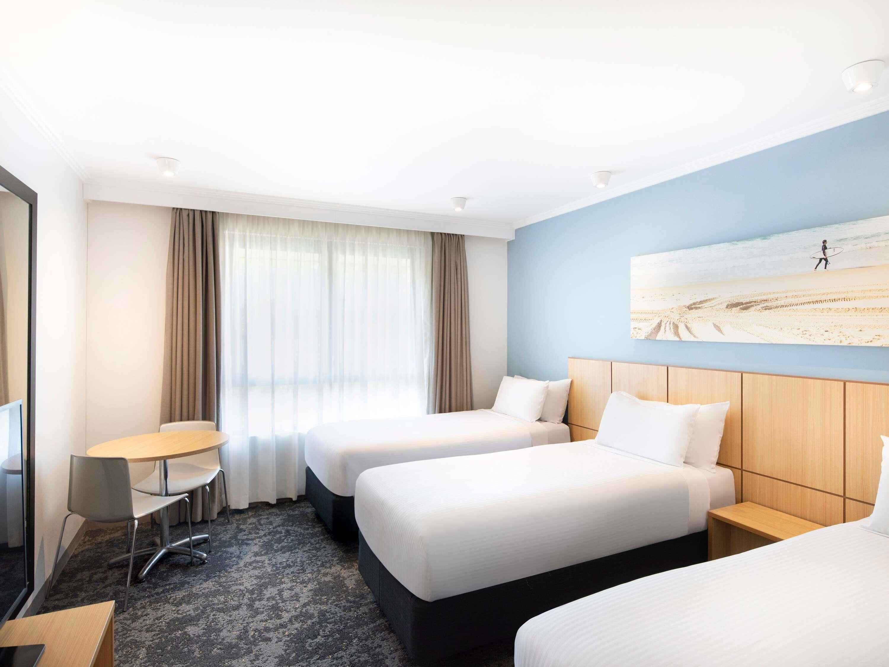 Standard Triple Room, 3 Twin Beds | In-room safe, iron/ironing board, free cribs/infant beds, rollaway beds