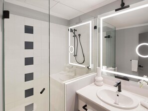 Shower, eco-friendly toiletries, hair dryer, bathrobes