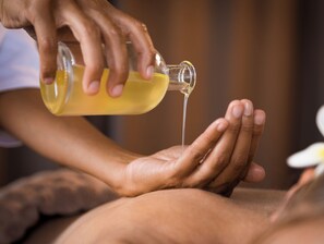 A person pouring a liquid onto another person's hand. - The Sebel Sydney Martin Place (Sydney)