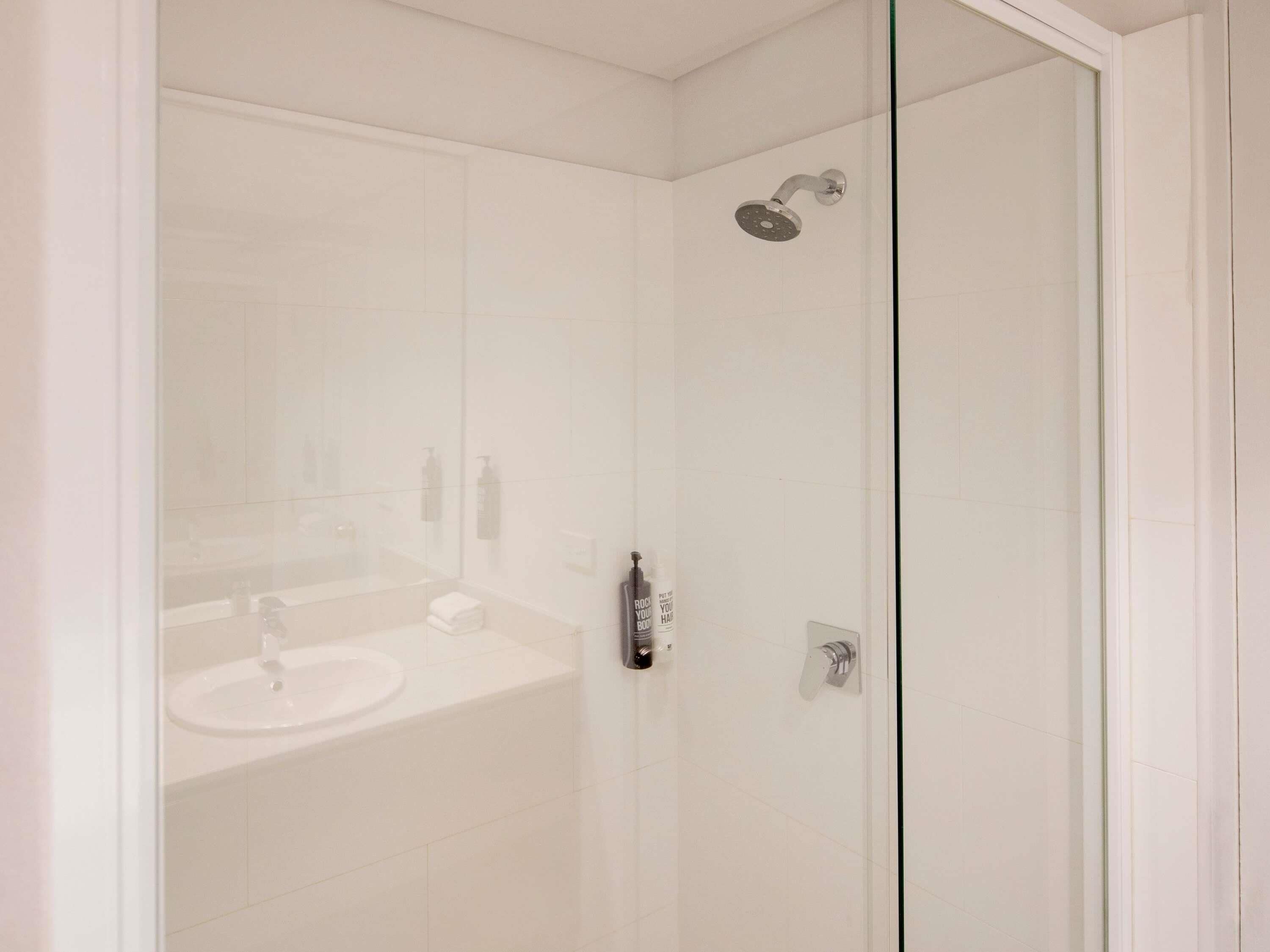 Shower, eco-friendly toiletries, hair dryer, towels