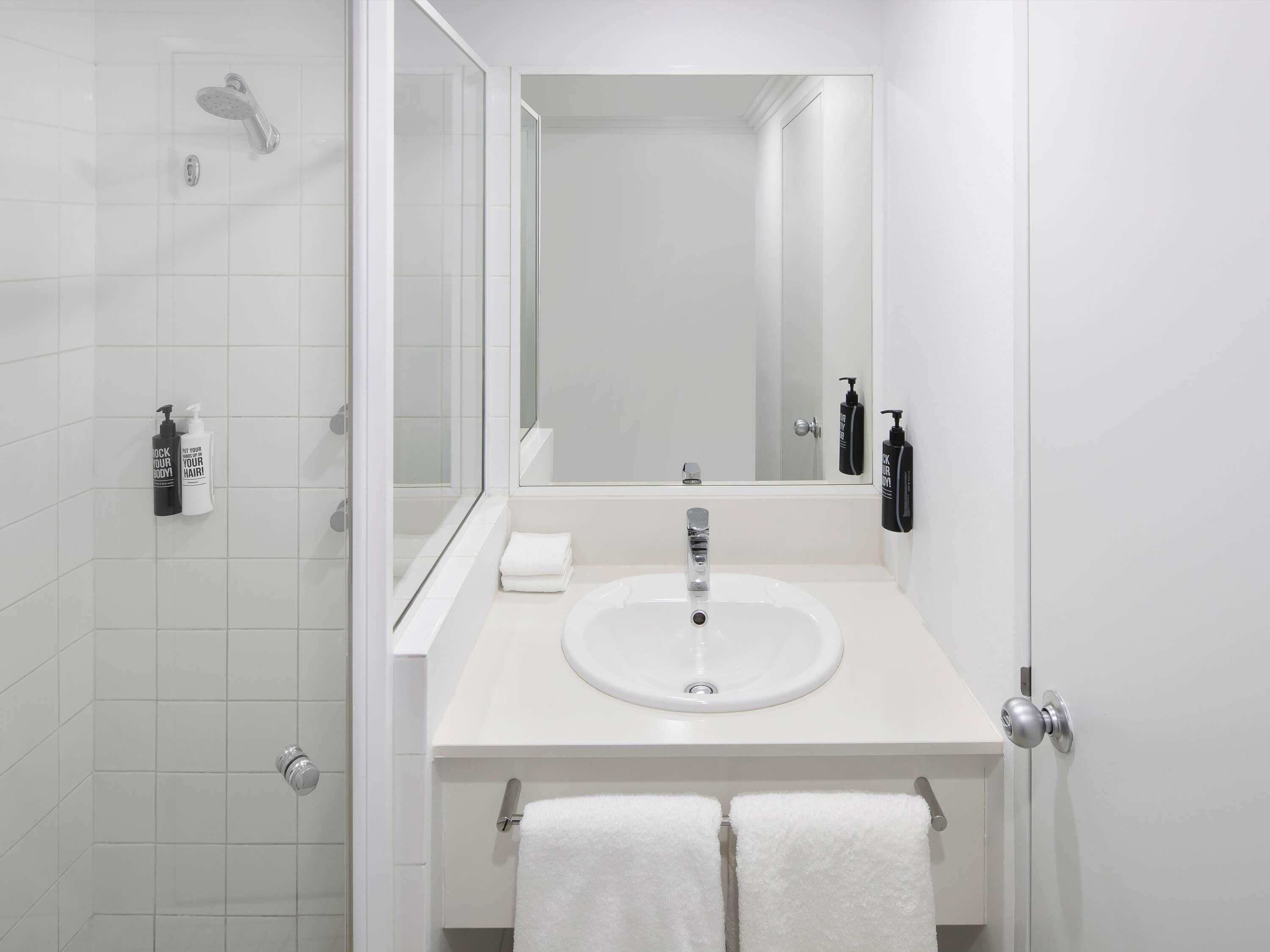 Shower, eco-friendly toiletries, hair dryer, towels