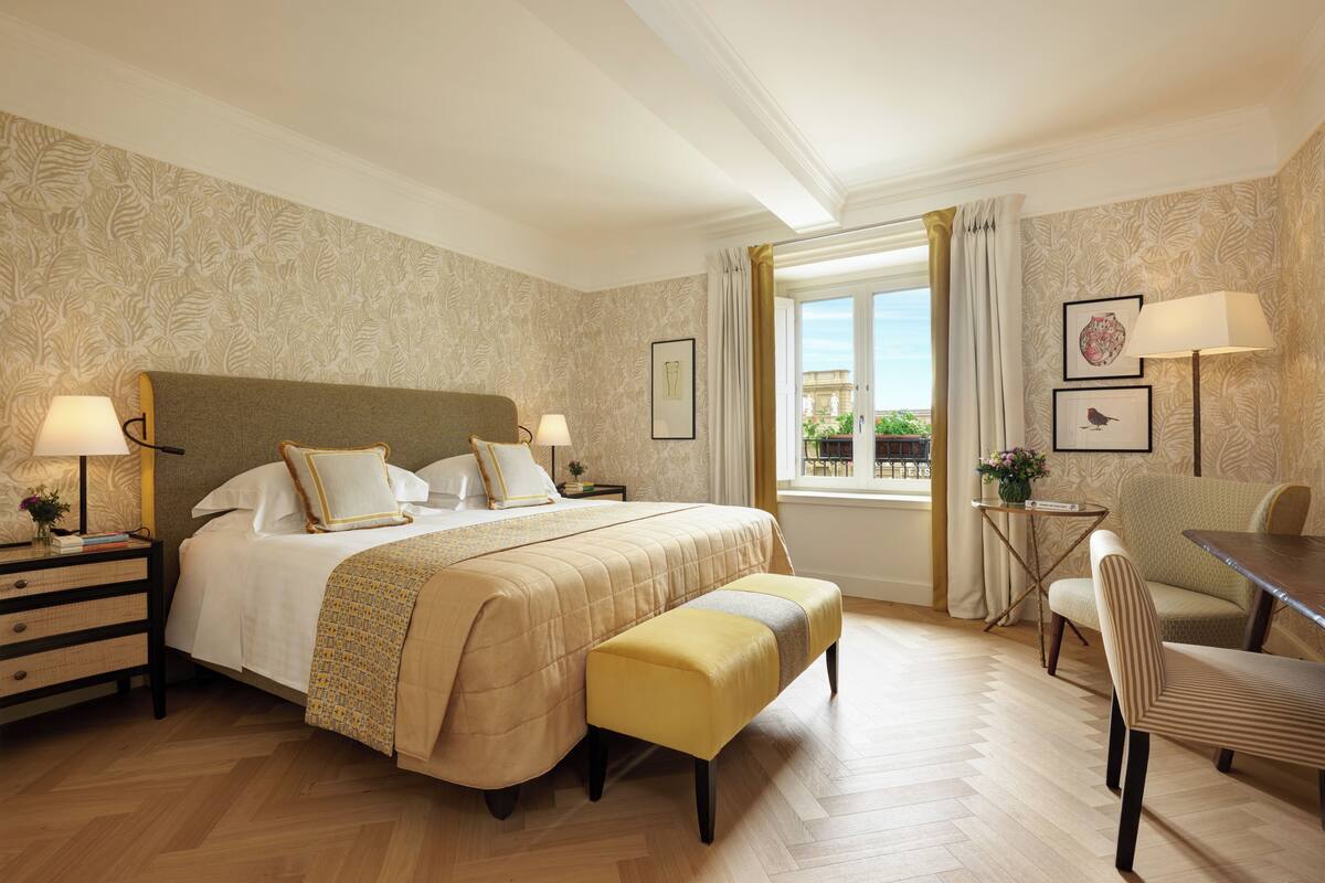 Premium bedding, down comforters, pillowtop beds, minibar