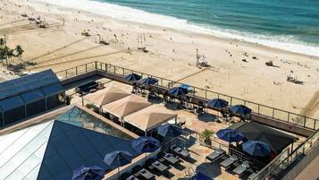 Outdoor pool, free pool cabanas, pool umbrellas