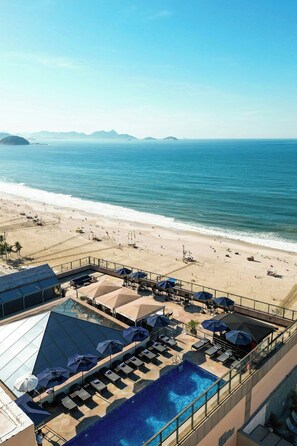 Outdoor pool, free cabanas, pool umbrellas