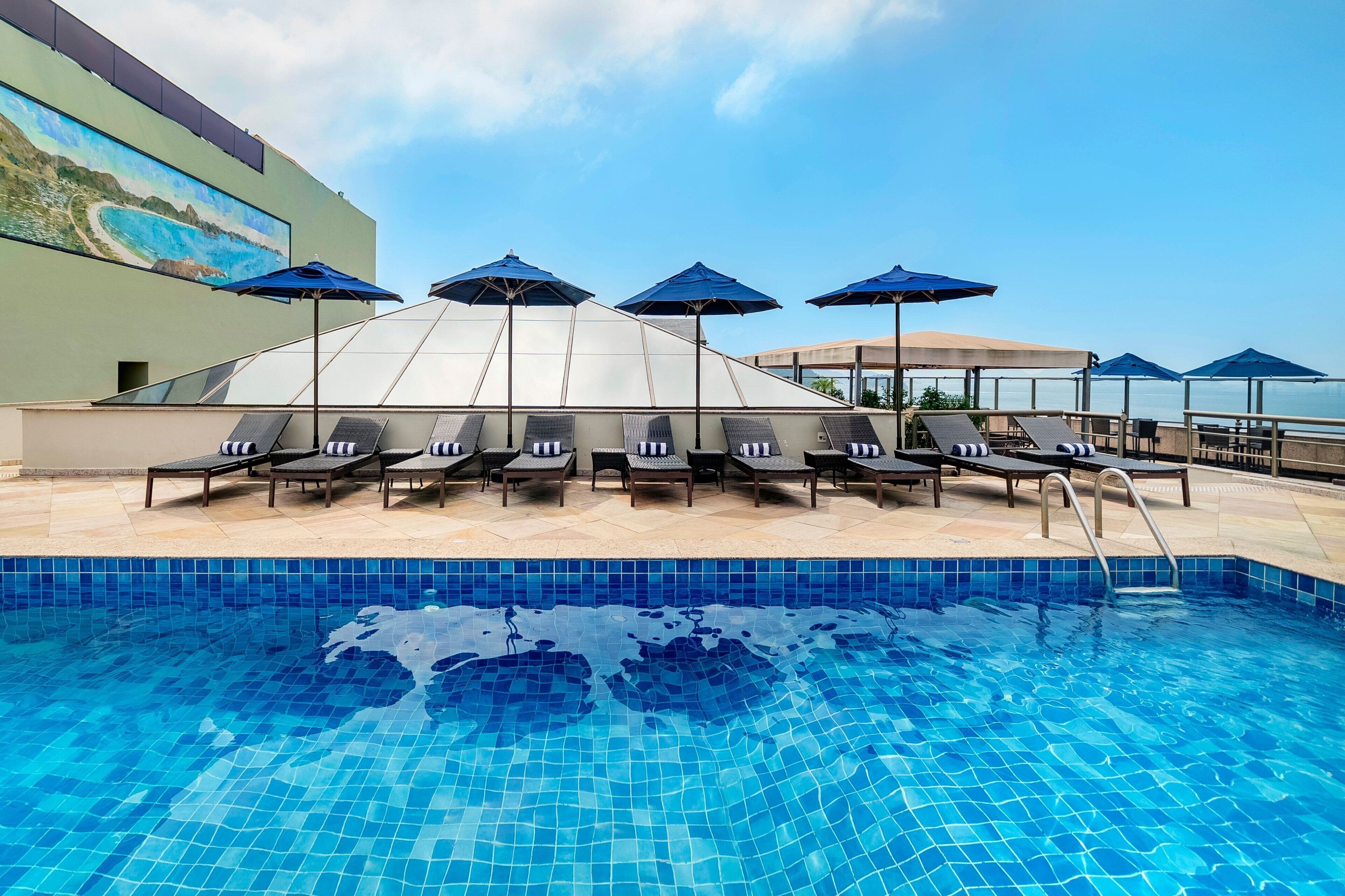 outdoor pool, free pool cabanas, pool umbrellas