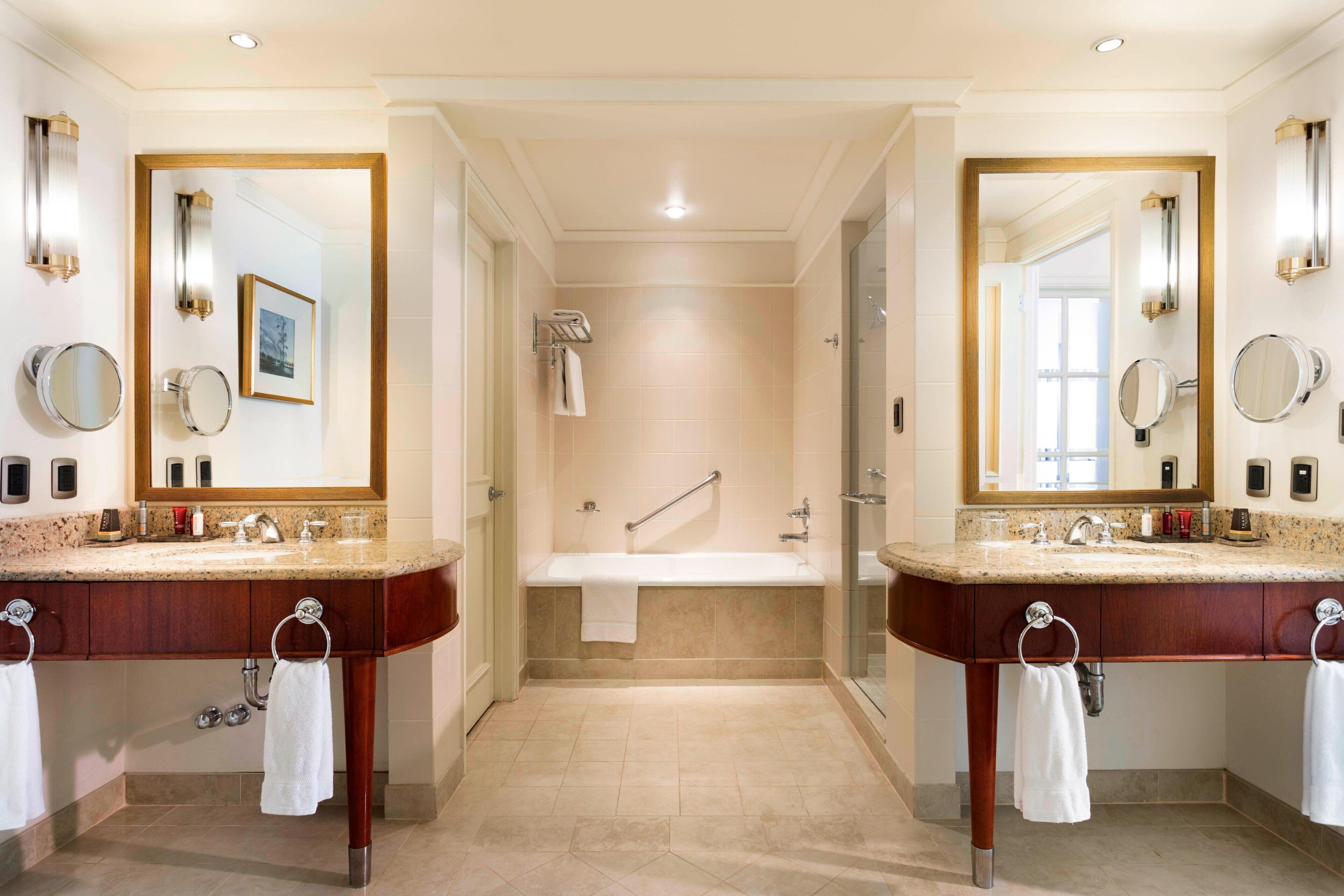 suite, 1 bedroom, non smoking, executive level (twobay suite) | bathroom | combined shower/bathtub, free toiletries, hair dryer, bathrobes