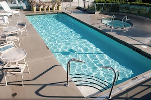 Outdoor pool, open 6:00 AM to 10:00 PM, sun loungers