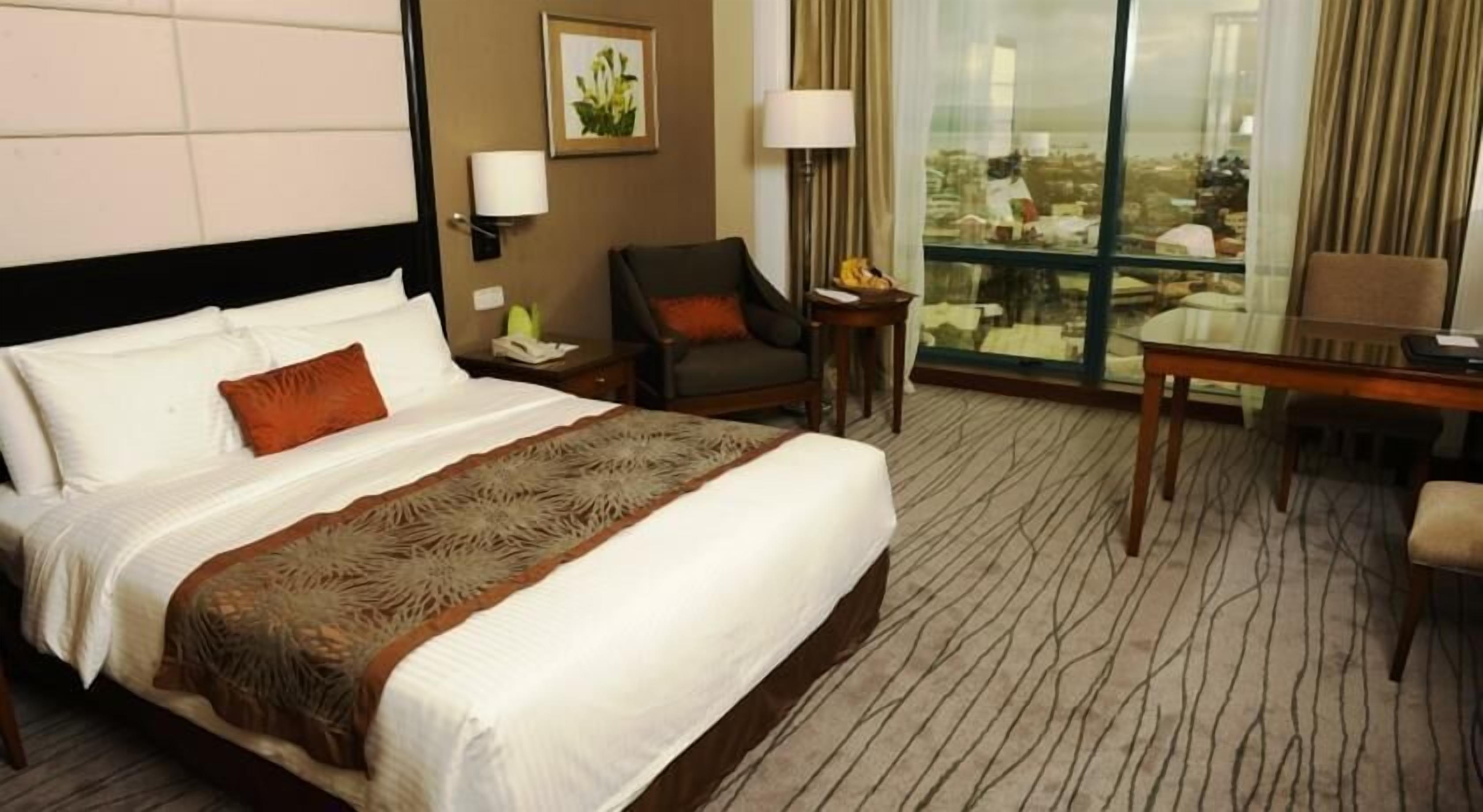 in-room safe, desk, blackout curtains, iron/ironing board