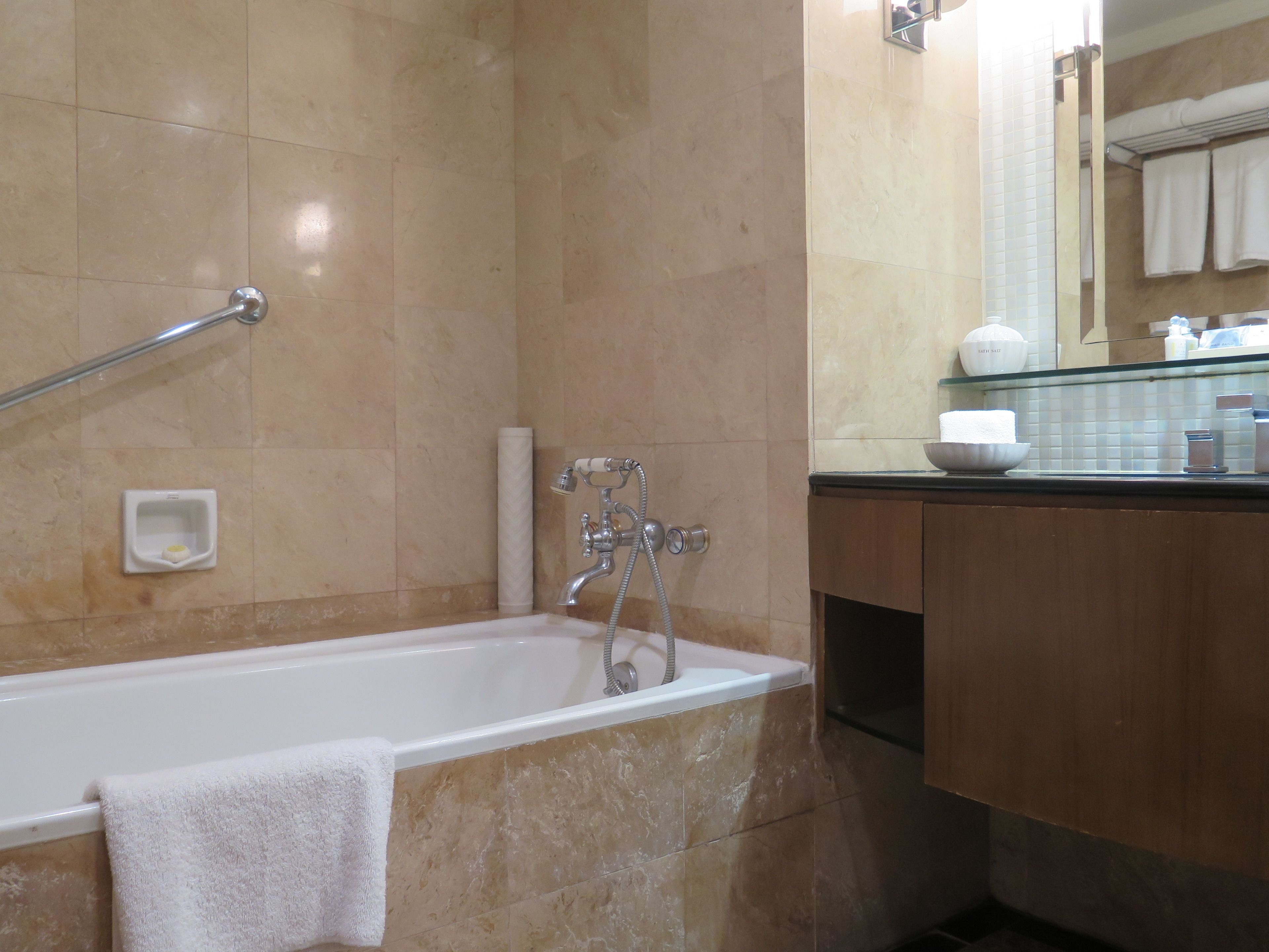 combined shower/bathtub, free toiletries, hair dryer, bathrobes