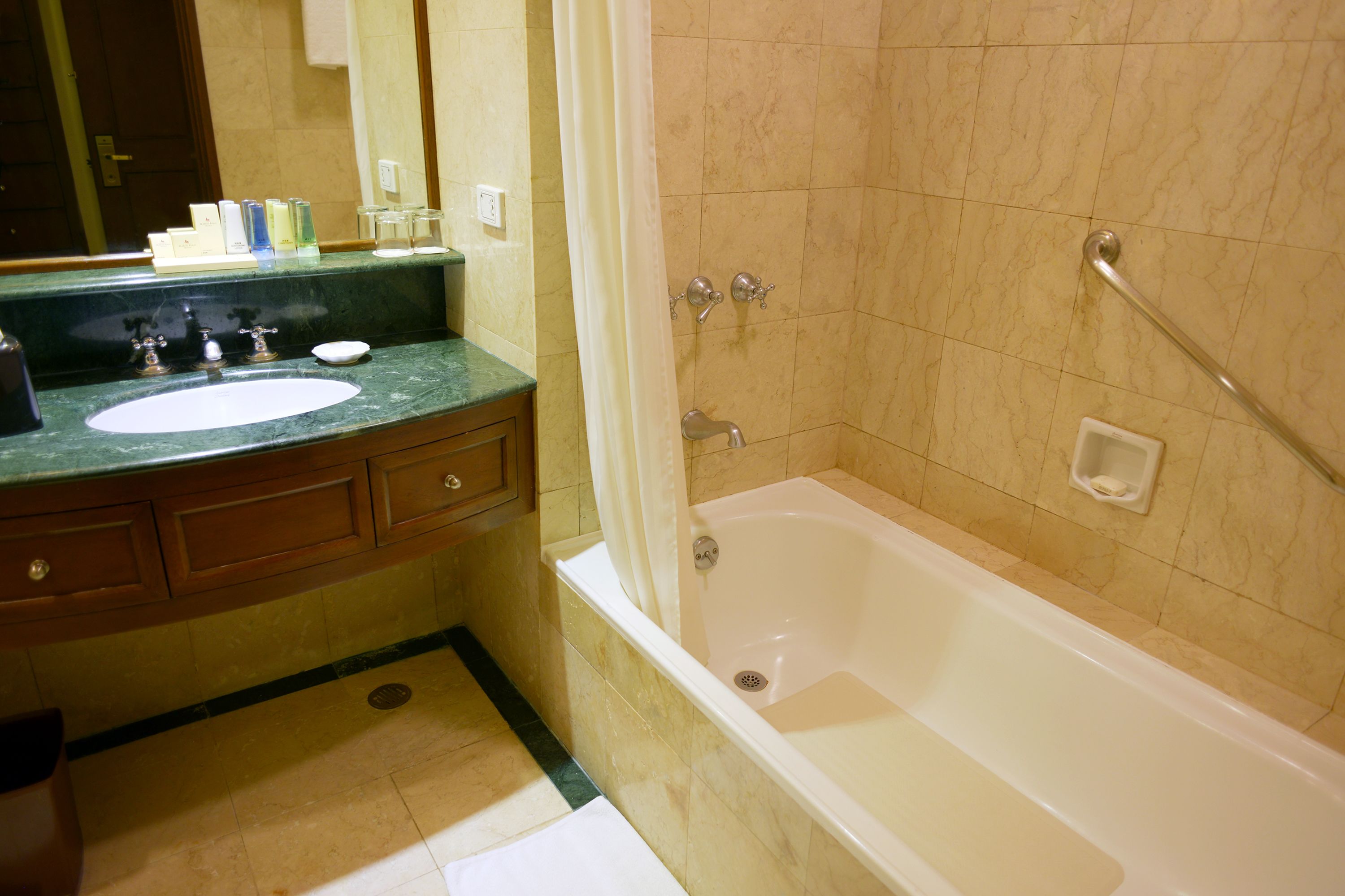 combined shower/bathtub, free toiletries, hair dryer, bathrobes