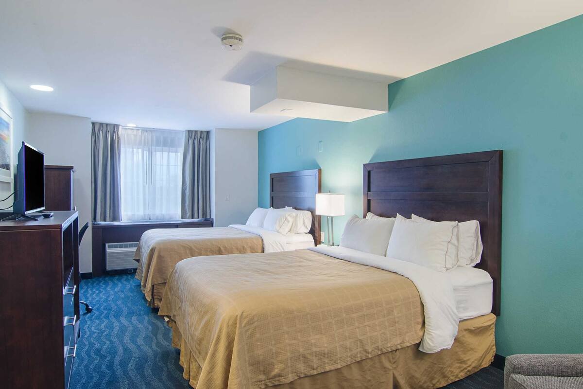 standard room, 2 queen beds, non smoking | pillow-top beds, desk, blackout curtains, iron/ironing board