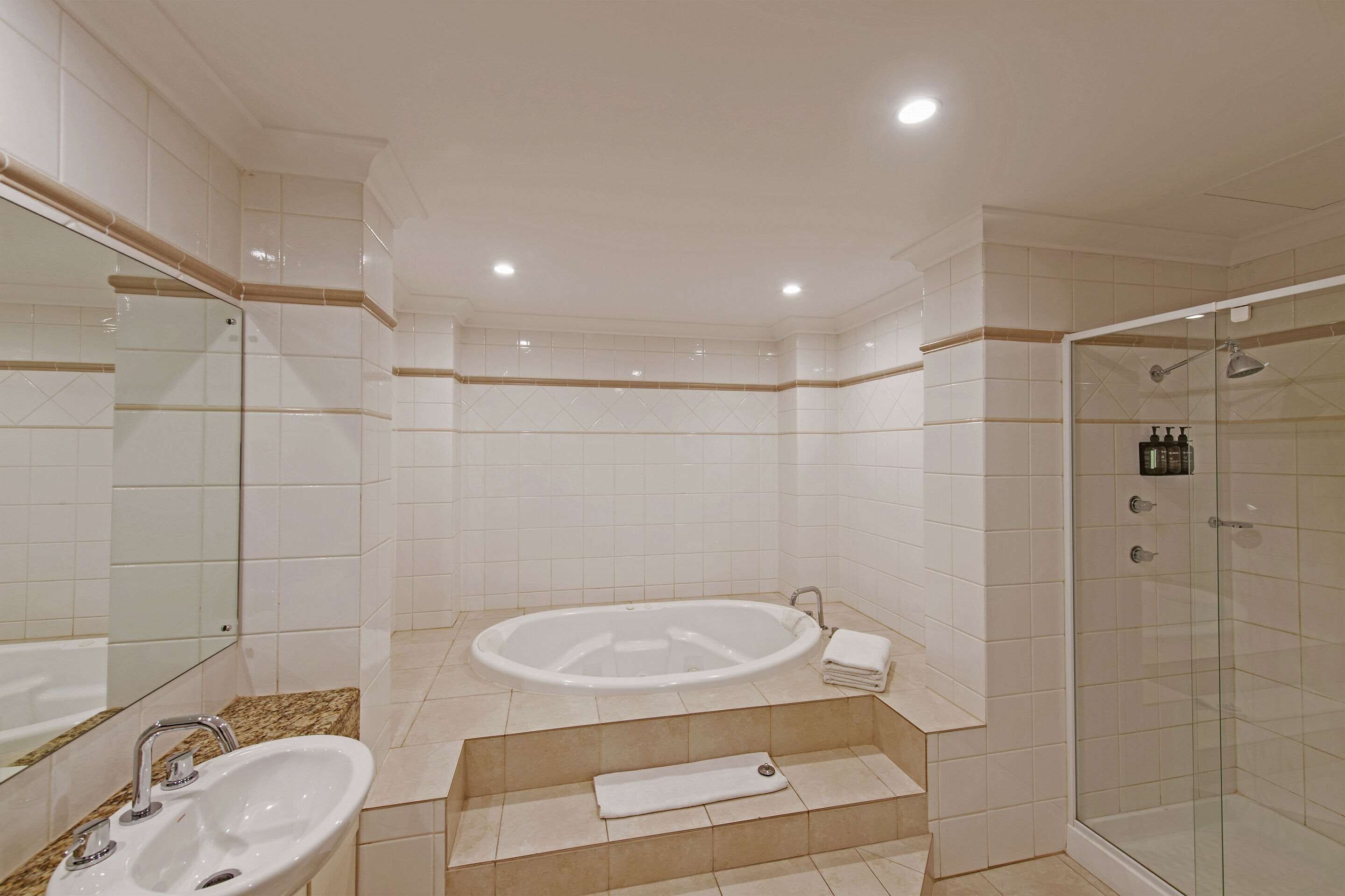 one bedroom spa apartment | bathroom | free toiletries, hair dryer, towels, soap