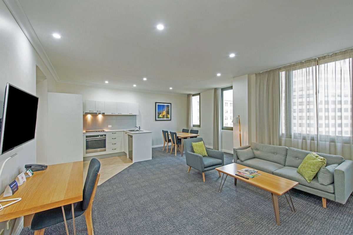 three bedroom apartment | in-room safe, desk, laptop workspace, soundproofing